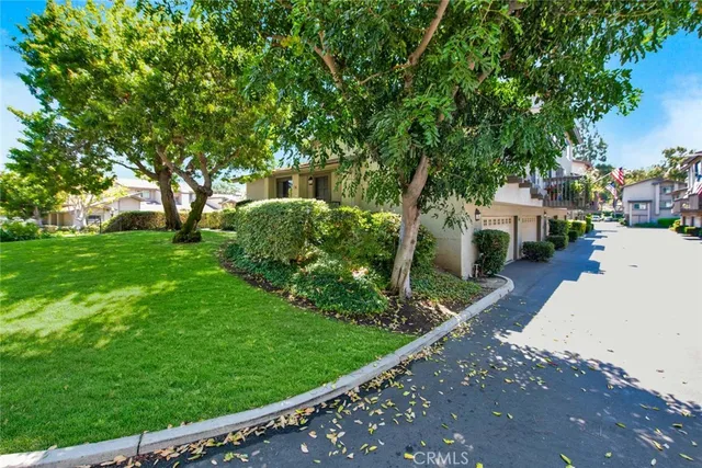 a view of a street with a houses