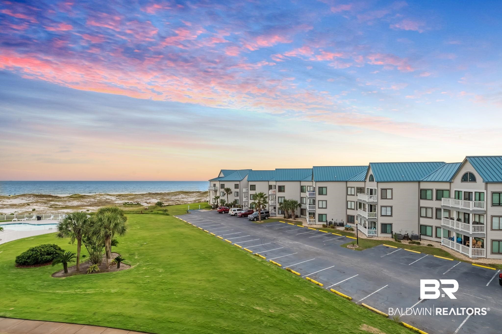 645 Plantation Road, Unit 6412 Gulf Shores, AL 36542 - Photo 71 of 72 Aerial view at dusk with a water view
