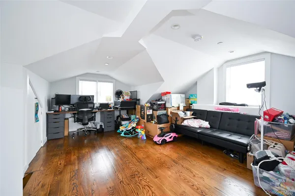 a view of a bedroom with washer and dryer