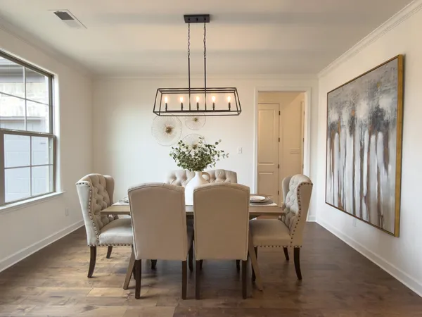 a large kitchen with stainless steel appliances lots of counter space and window