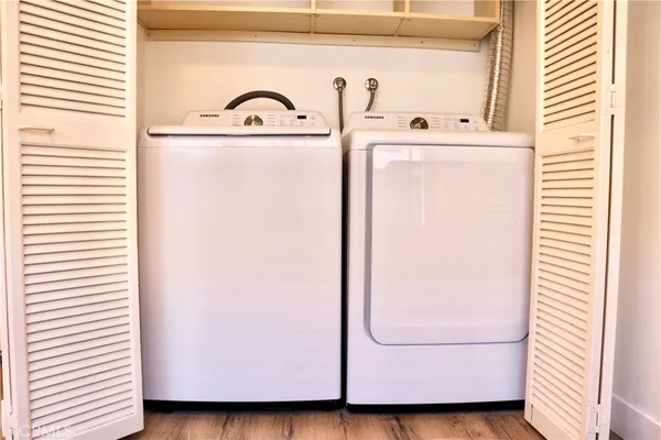 a bathroom with a bathtub and a mirror