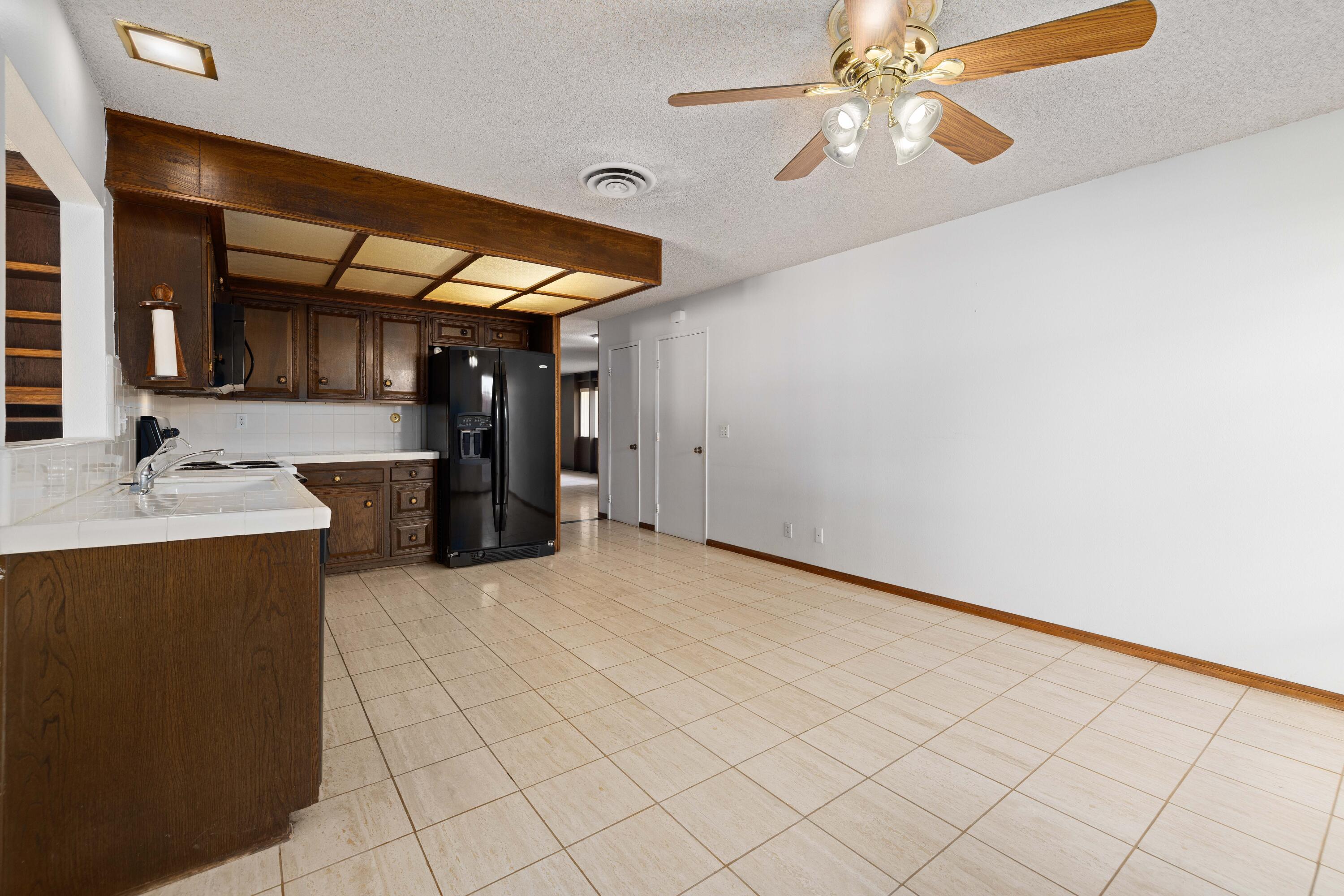 37800 Rudall Avenue Palmdale, CA 93550 - Photo 12 of 35 a view of a kitchen with a sink and cabinets
