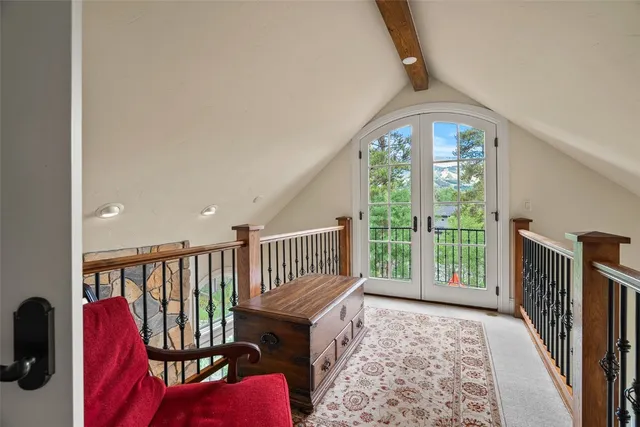 a view of an chairs in the balcony