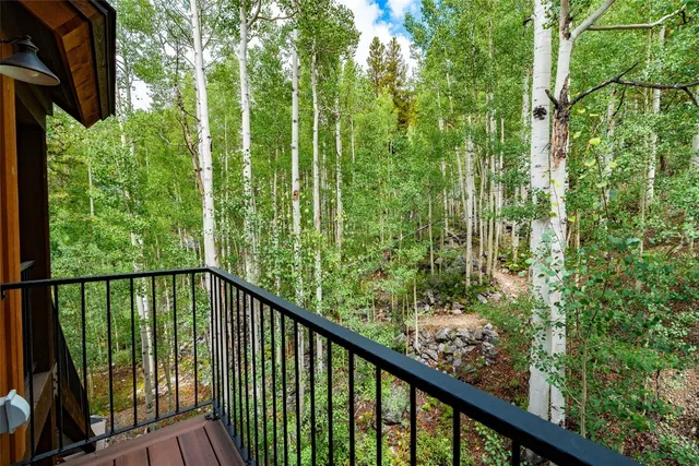 an aerial view of a house with yard swimming pool and outdoor seating