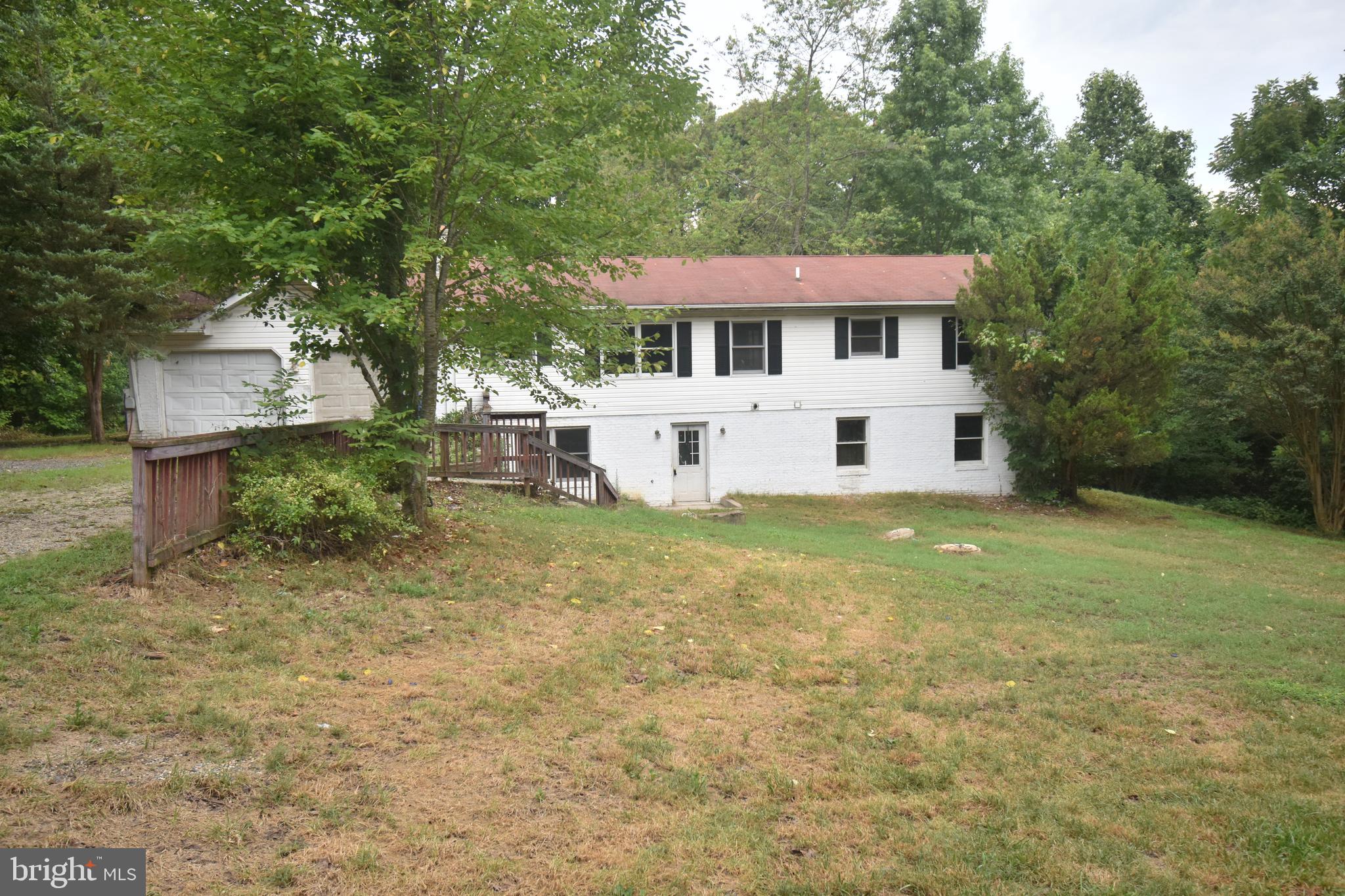 3838 Sixes Road Prince Frederick, MD 20678 - Photo 2 of 12 a front view of a house with a yard
