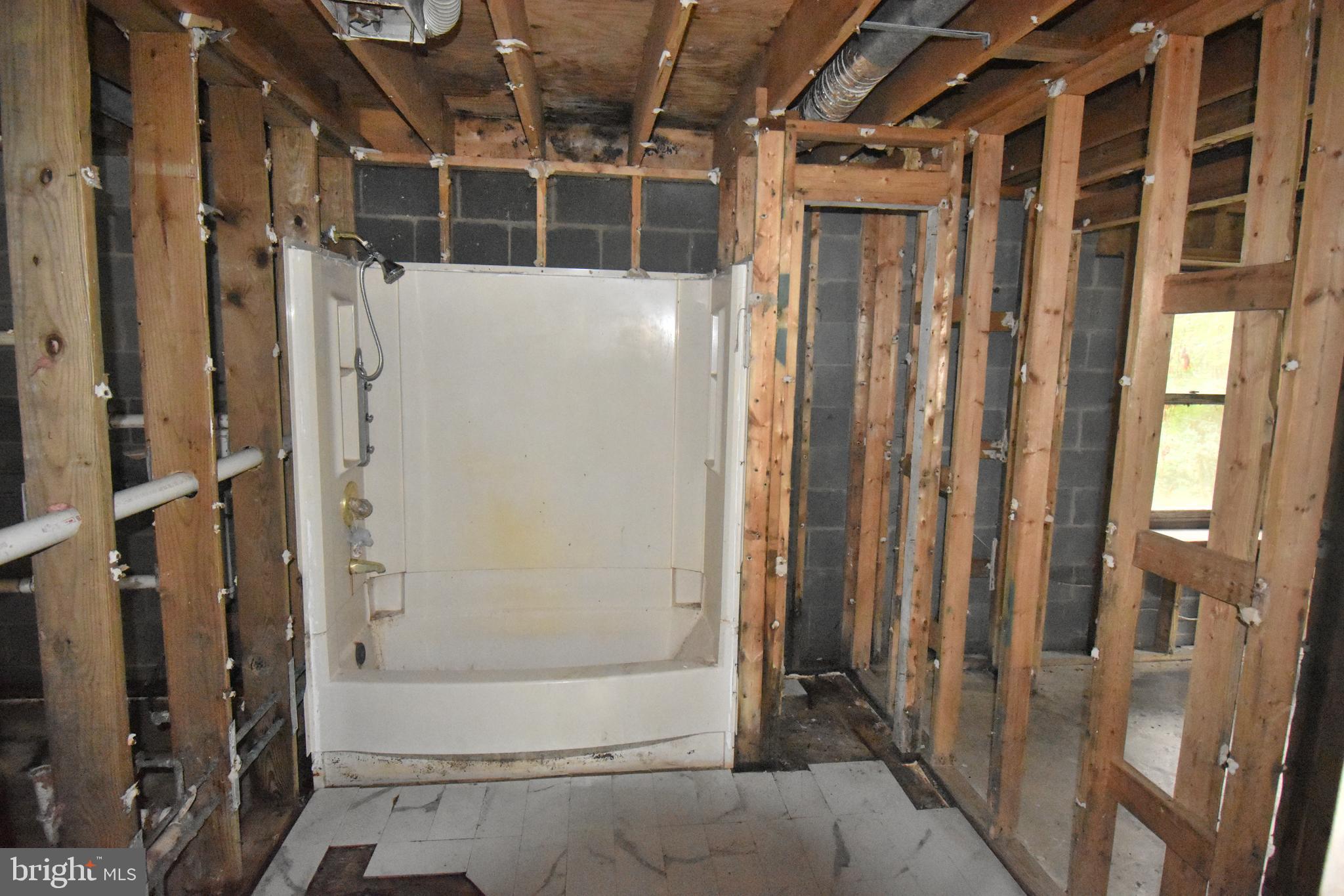 3838 Sixes Road Prince Frederick, MD 20678 - Photo 9 of 12 a view of a bathroom with a glass door