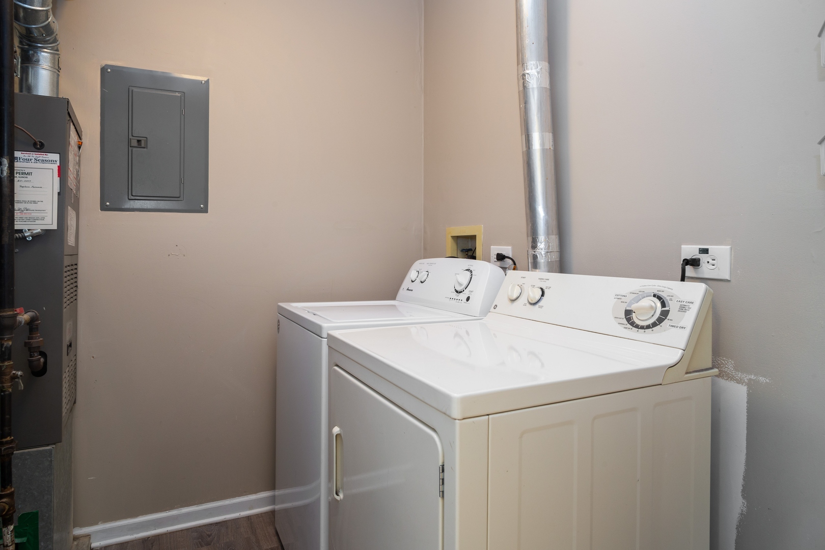 153 Inverness Court Elk Grove Village, IL 60007 - Photo 13 of 16 a utility room with dryer and washer