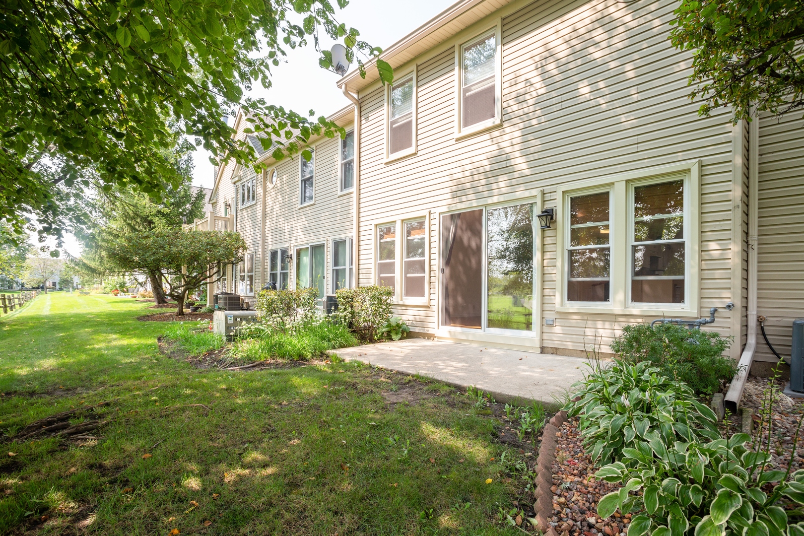 153 Inverness Court Elk Grove Village, IL 60007 - Photo 16 of 16 a house view with a garden space