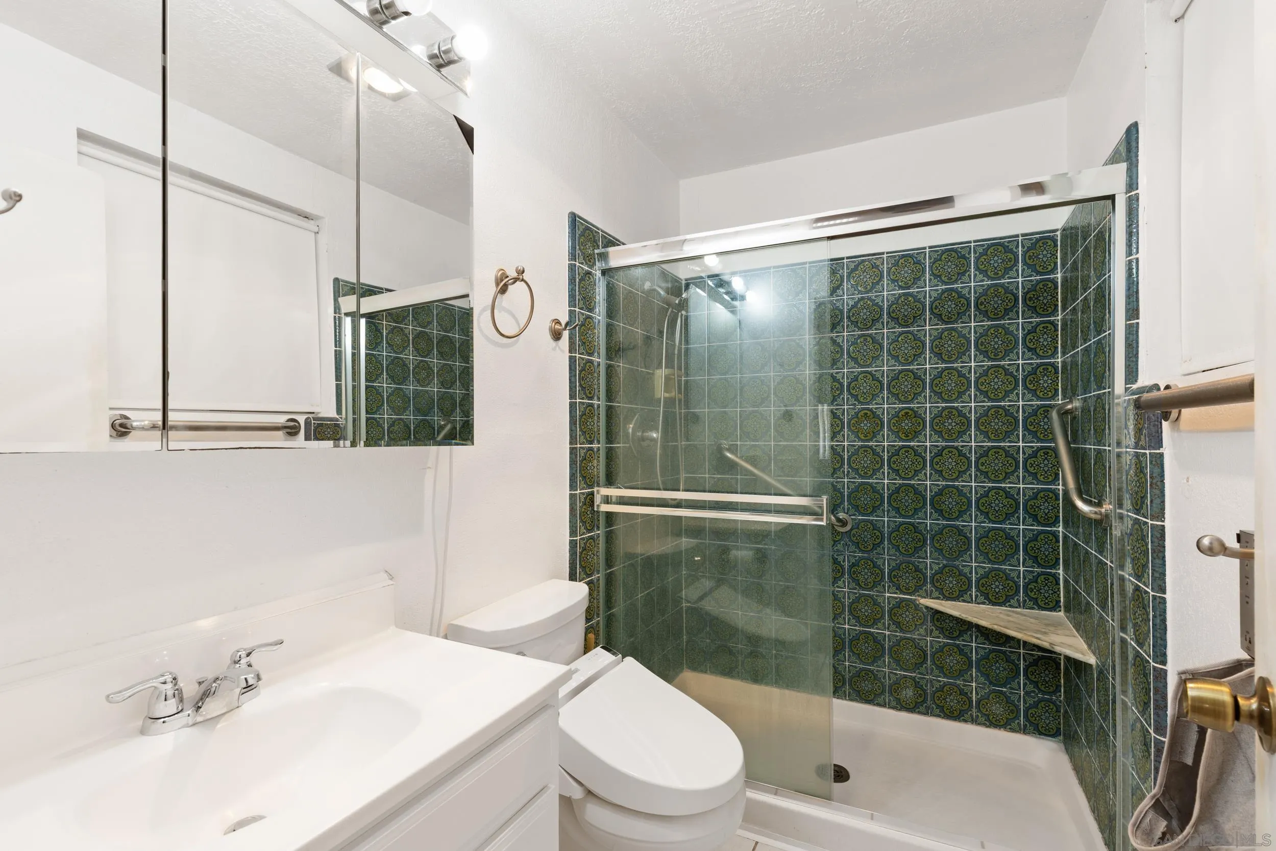 538 Paraiso Avenue Spring Valley, CA 91977 - Photo 14 of 17 a bathroom with a sink toilet and shower