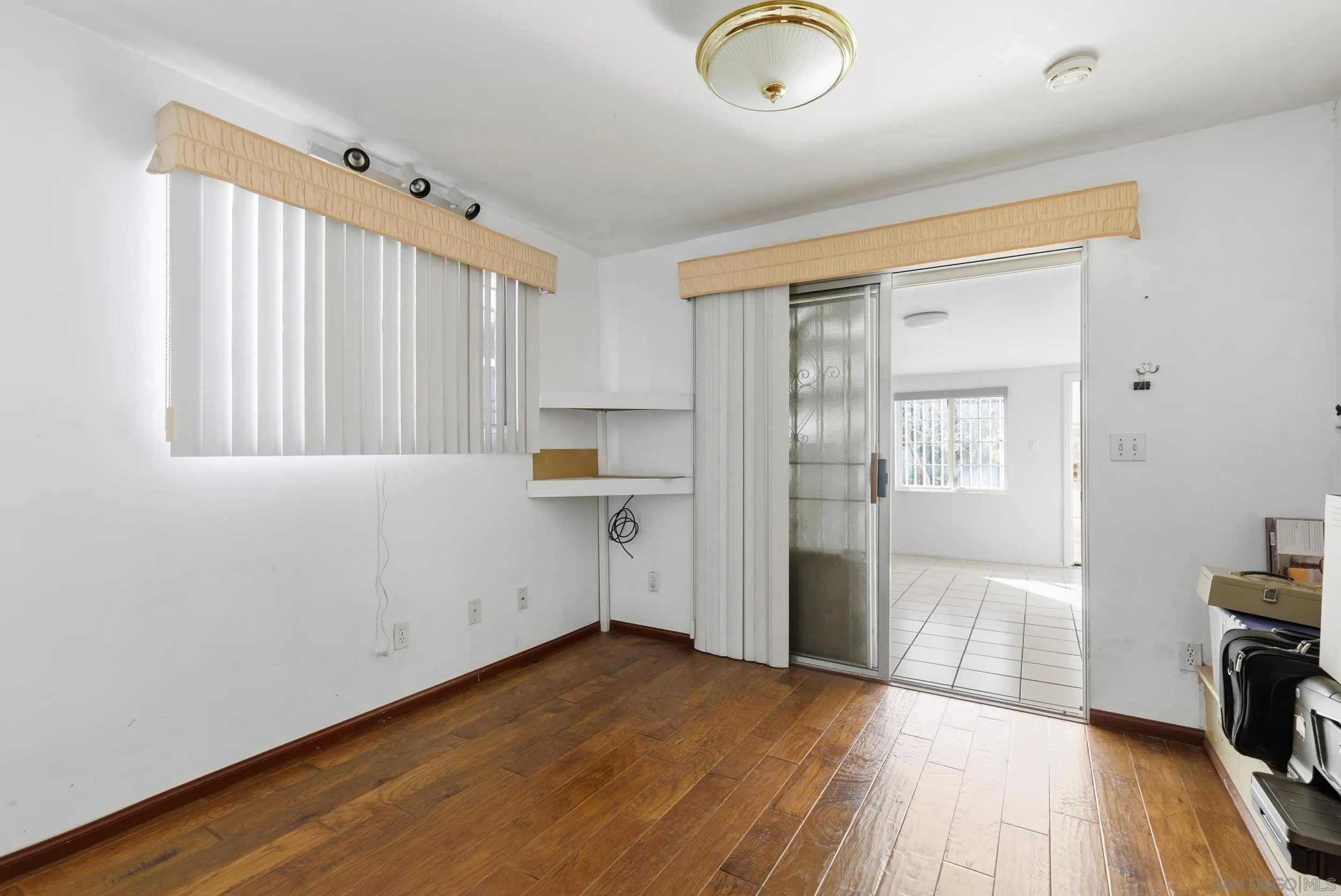 538 Paraiso Avenue Spring Valley, CA 91977 - Photo 8 of 17 a view of empty room with wooden floor