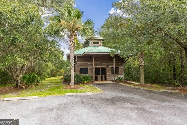 a bathroom with a tub sink and a mirror