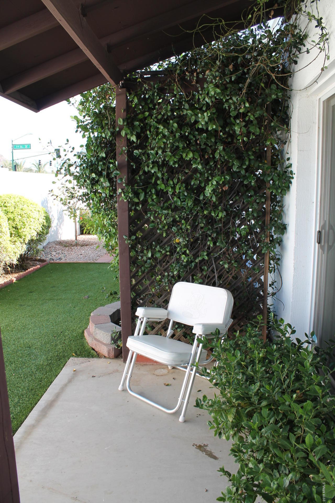 636 East Piping Rock Road Phoenix, AZ 85022 - Photo 15 of 33 Backyard with synthetic grass