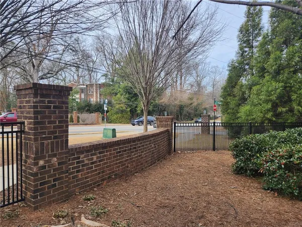 a swimming pool with outdoor seating and yard