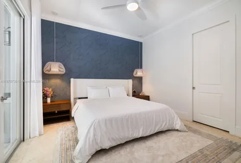 a bathroom with a granite countertop toilet a sink and a shower