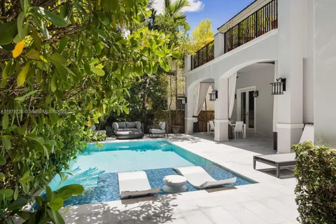 a front view of a house with swimming pool