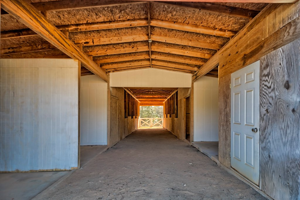 411 Redds Branch Road Aiken, SC 29801 - Photo 23 of 25 a view of a hallway with a car garage