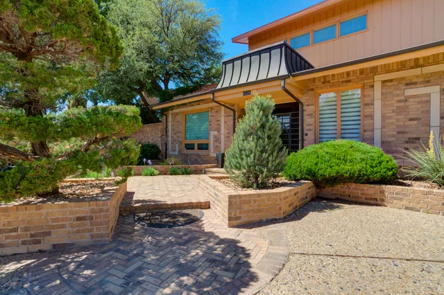 front view of a house with a street
