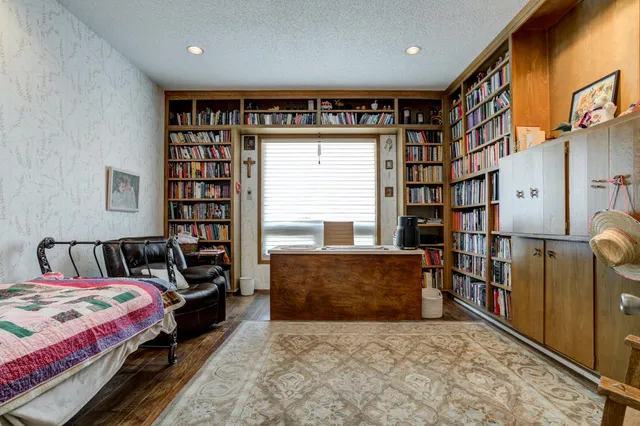 a bathroom with a shower and a toilet
