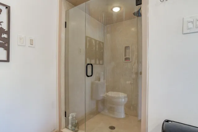 a view of a park with large trees