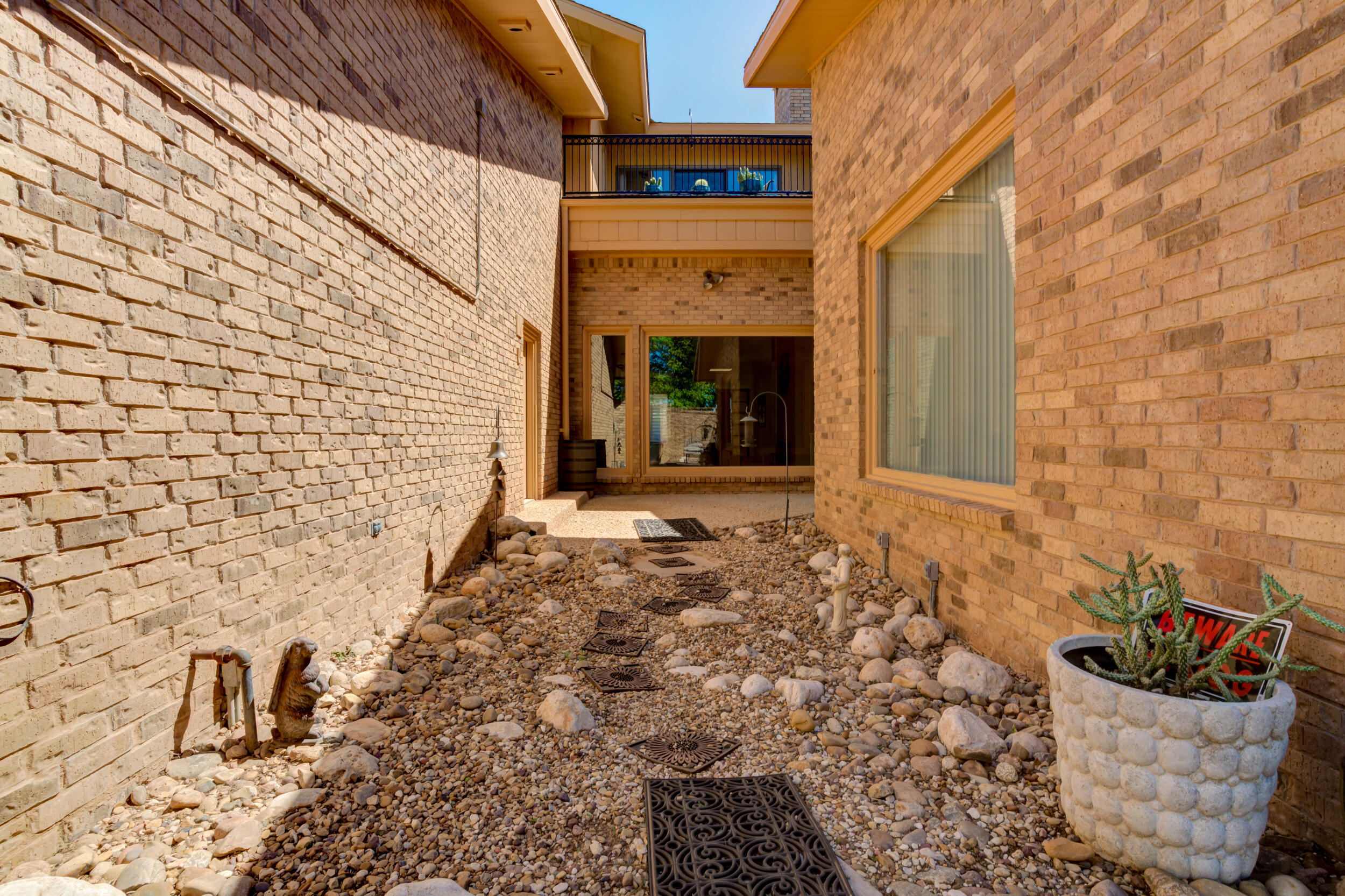 4528 7th Street Lubbock, TX 79416 - Photo 66 of 69 a front view of a house with seating space