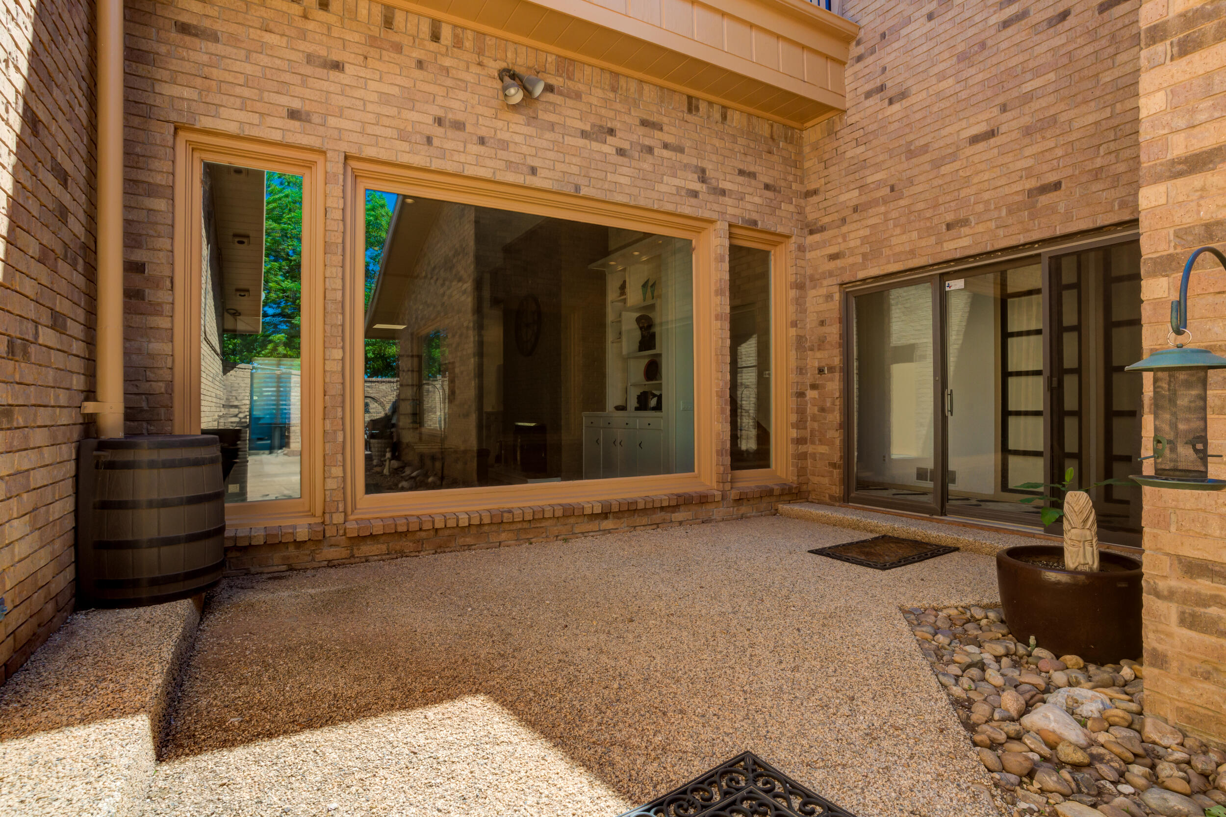 4528 7th Street Lubbock, TX 79416 - Photo 68 of 69 a view of a brick house with a large windows