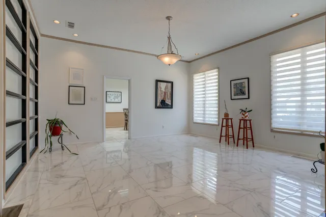a view of a dining room with furniture