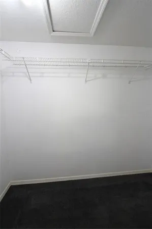 a view of a small space with a fan