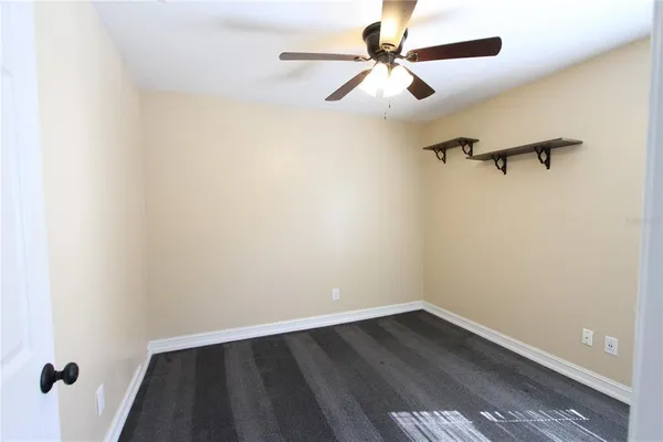 wooden floor in an empty room and a window