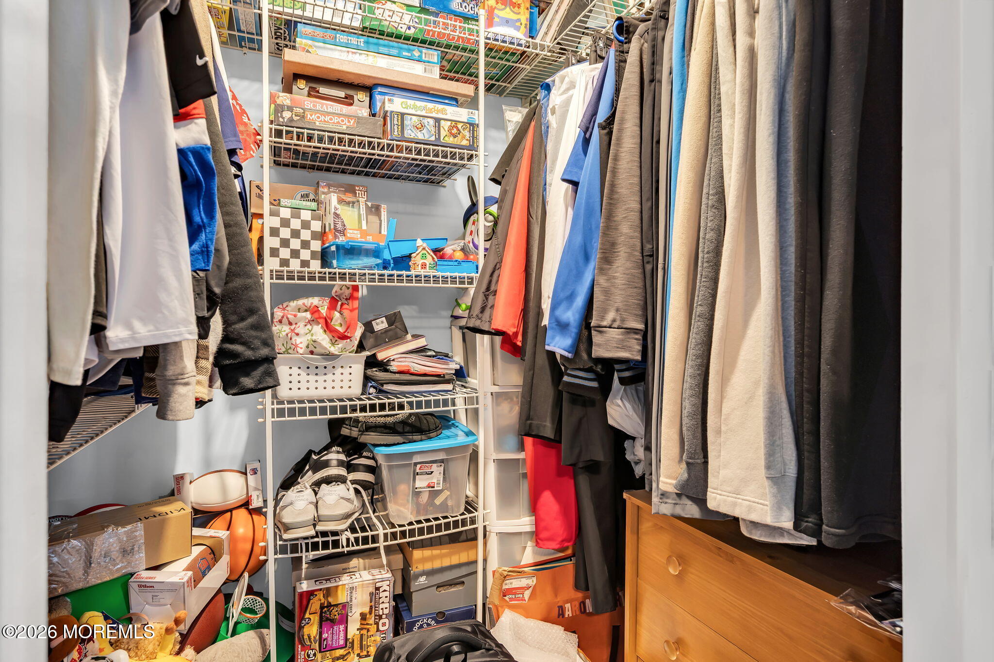 96 Yellowbank Road Toms River, NJ 08753 - Photo 36 of 45 a view of walk in closet with clothes and shoes