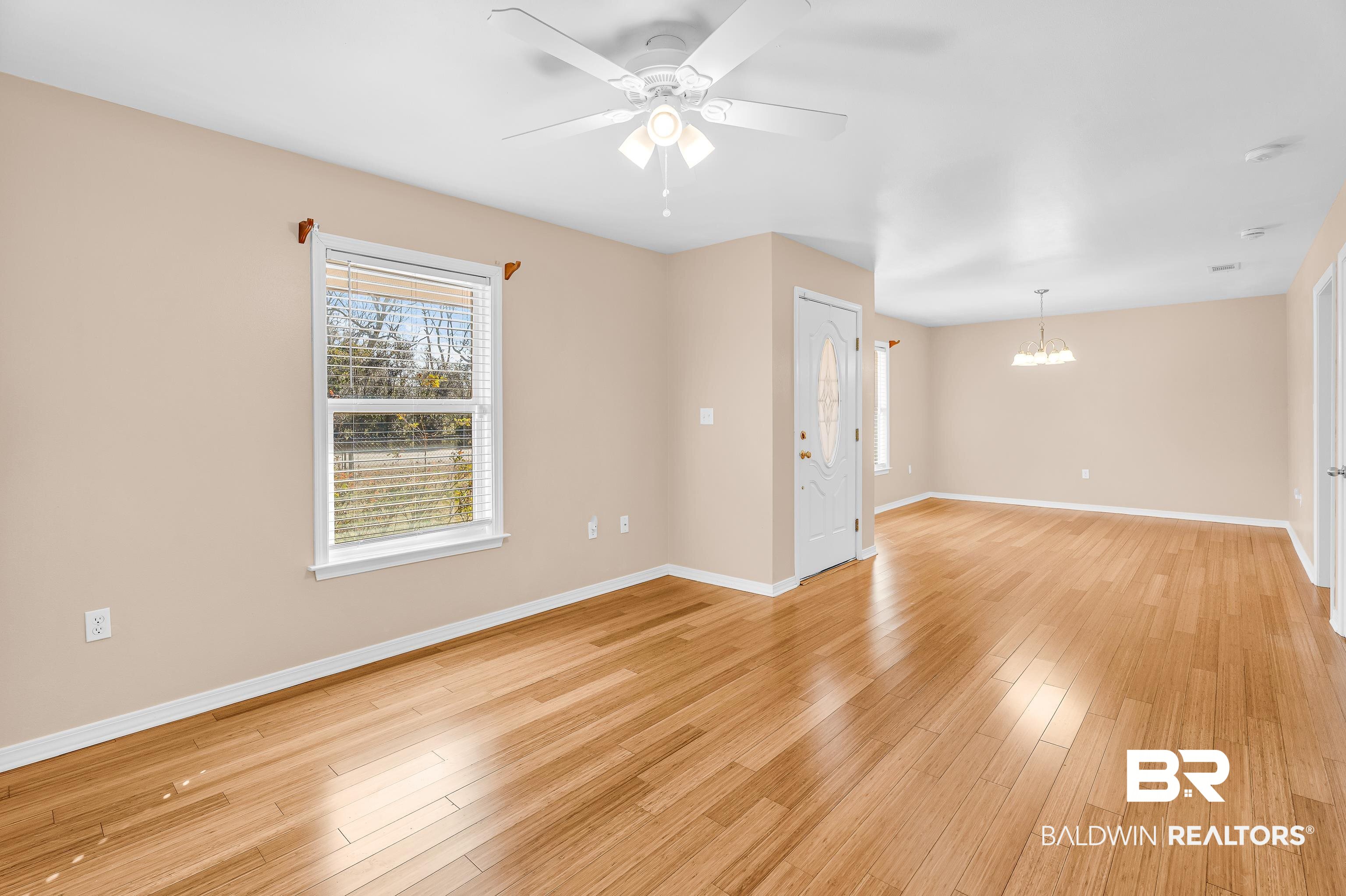 22095 8th Street Silverhill, AL 36576 - Photo 14 of 42 View in Living Room looking into formal dining room.
