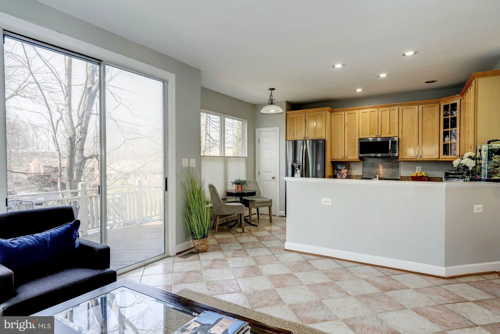11516 Waterhaven Court Reston, VA 20190 - Photo 12 of 46 Kitchen Great Room Sliding Glass Door to Back Deck