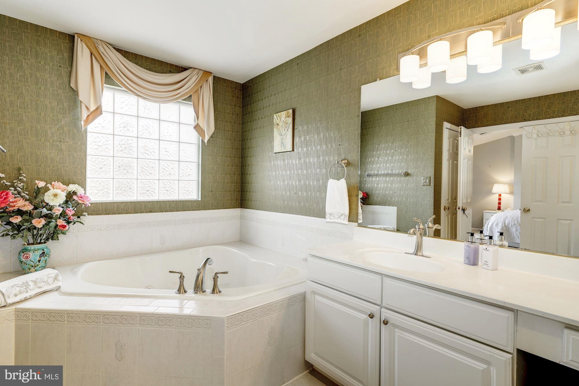 11516 Waterhaven Court Reston, VA 20190 - Photo 22 of 46 Spa Soaking Tub and Double Vanities in Owner Bath