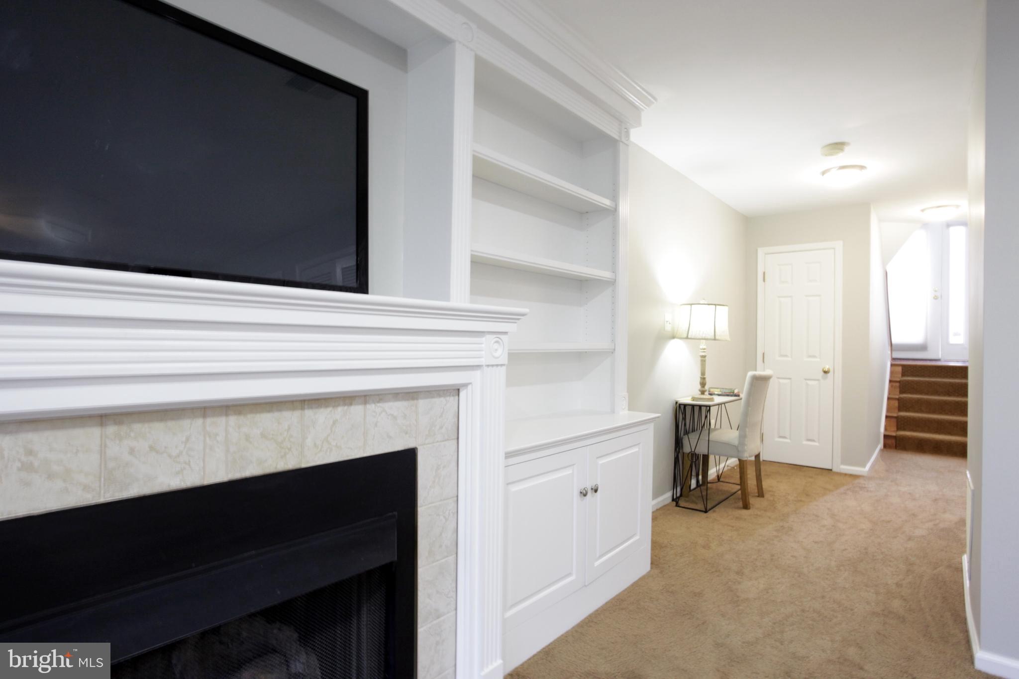 11516 Waterhaven Court Reston, VA 20190 - Photo 29 of 46 Walk Down from Foyer to Finished Lower Level Study