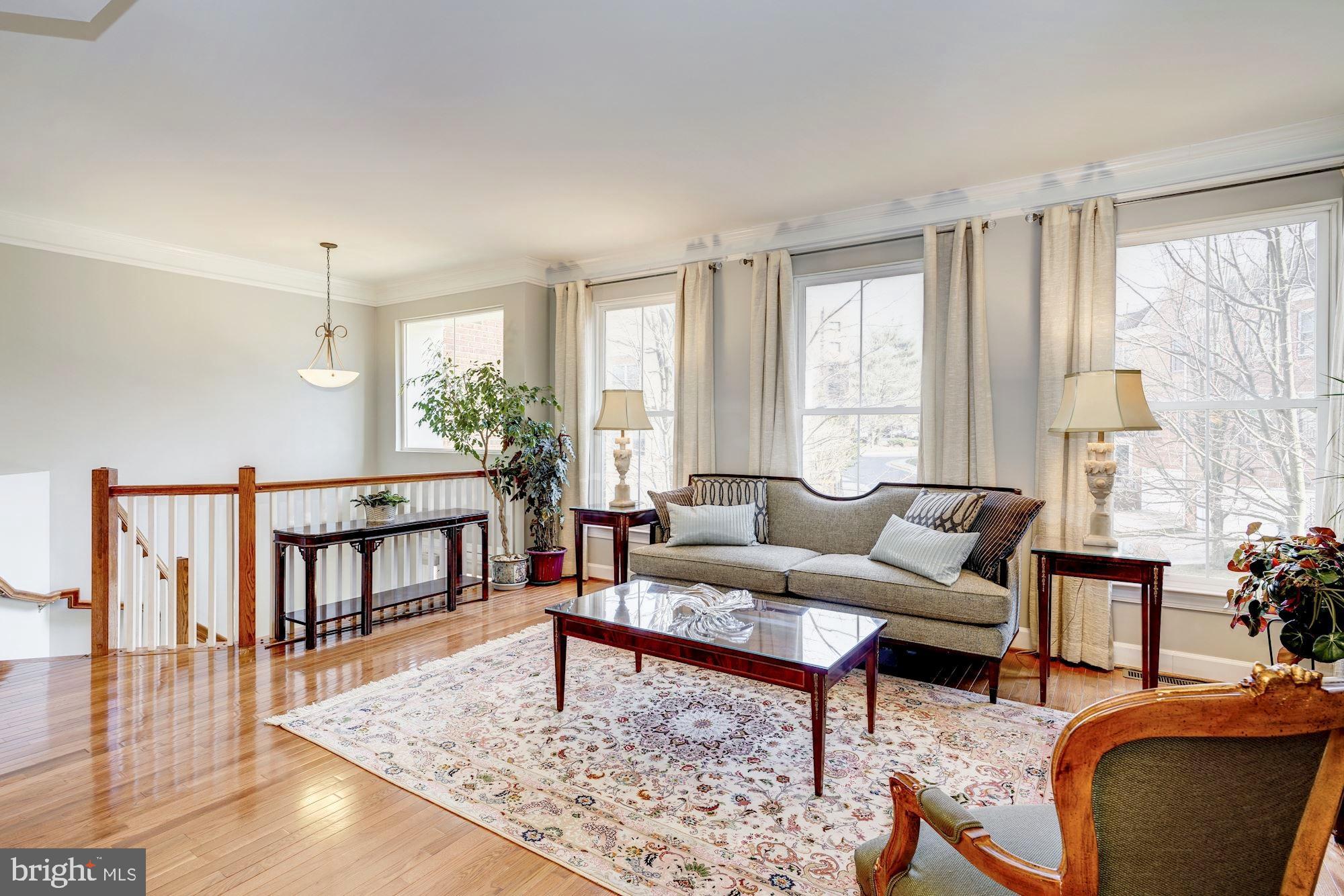 11516 Waterhaven Court Reston, VA 20190 - Photo 4 of 46 Formal Living Room with Light Oak Hardwoods