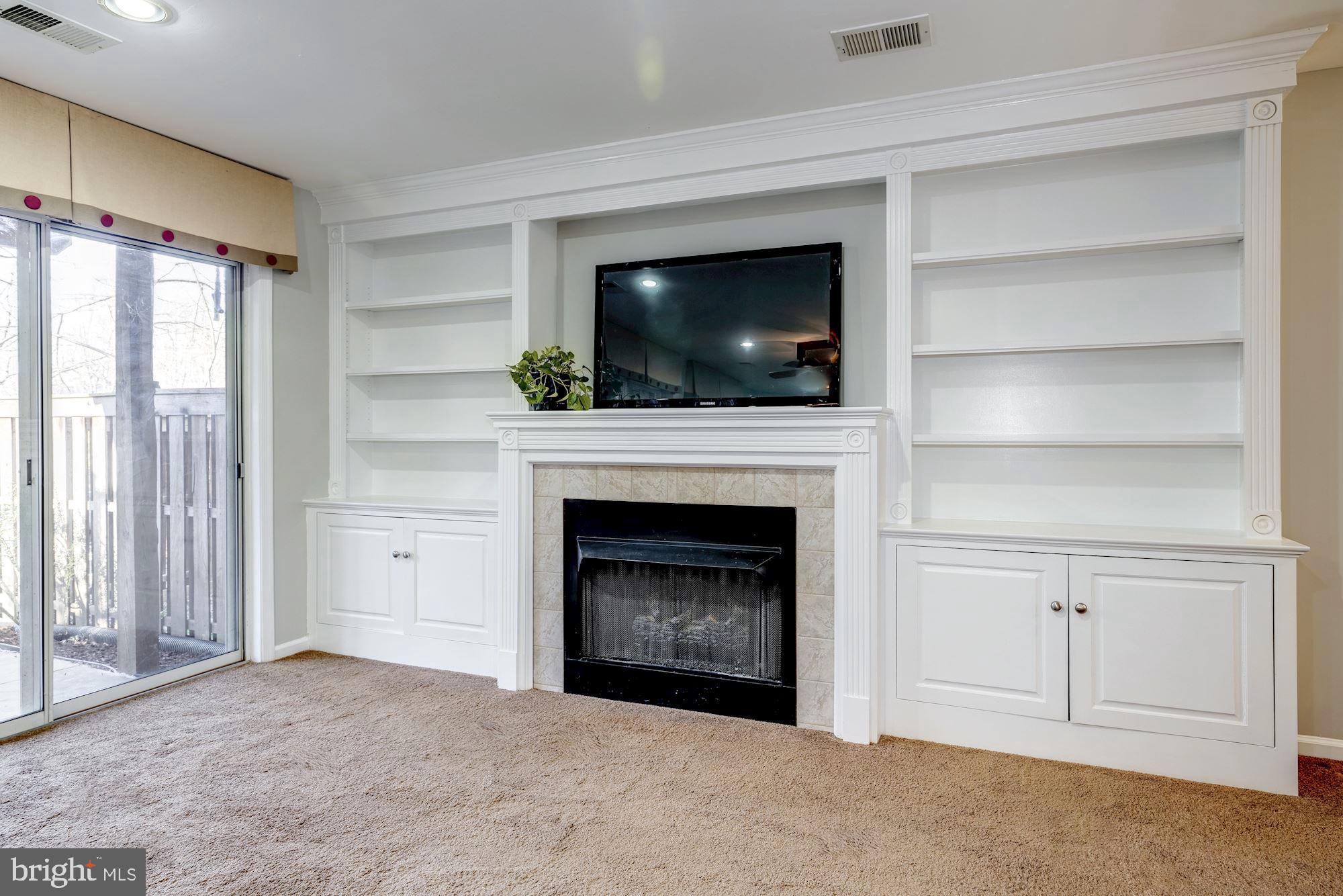 11516 Waterhaven Court Reston, VA 20190 - Photo 34 of 46 Media Wall Custom Built-Ins and 2nd Gas Fireplace