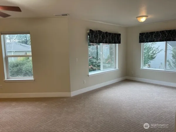 a view of an empty room with window