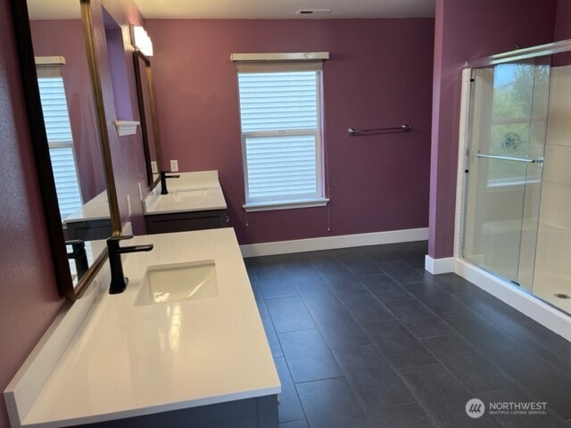 20446 Corbridge Road Southeast Monroe, WA 98272 - Photo 22 of 31 a view of a hallway with wooden floor and chair