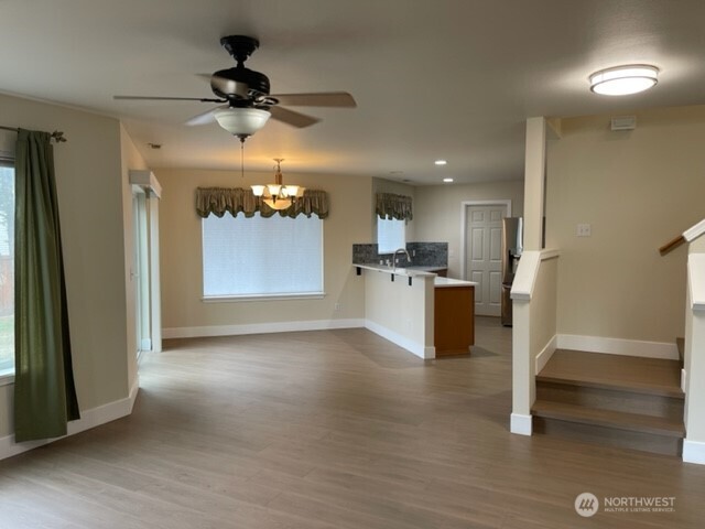 20446 Corbridge Road Southeast Monroe, WA 98272 - Photo 7 of 31 a view of a kitchen with a sink and cabinet