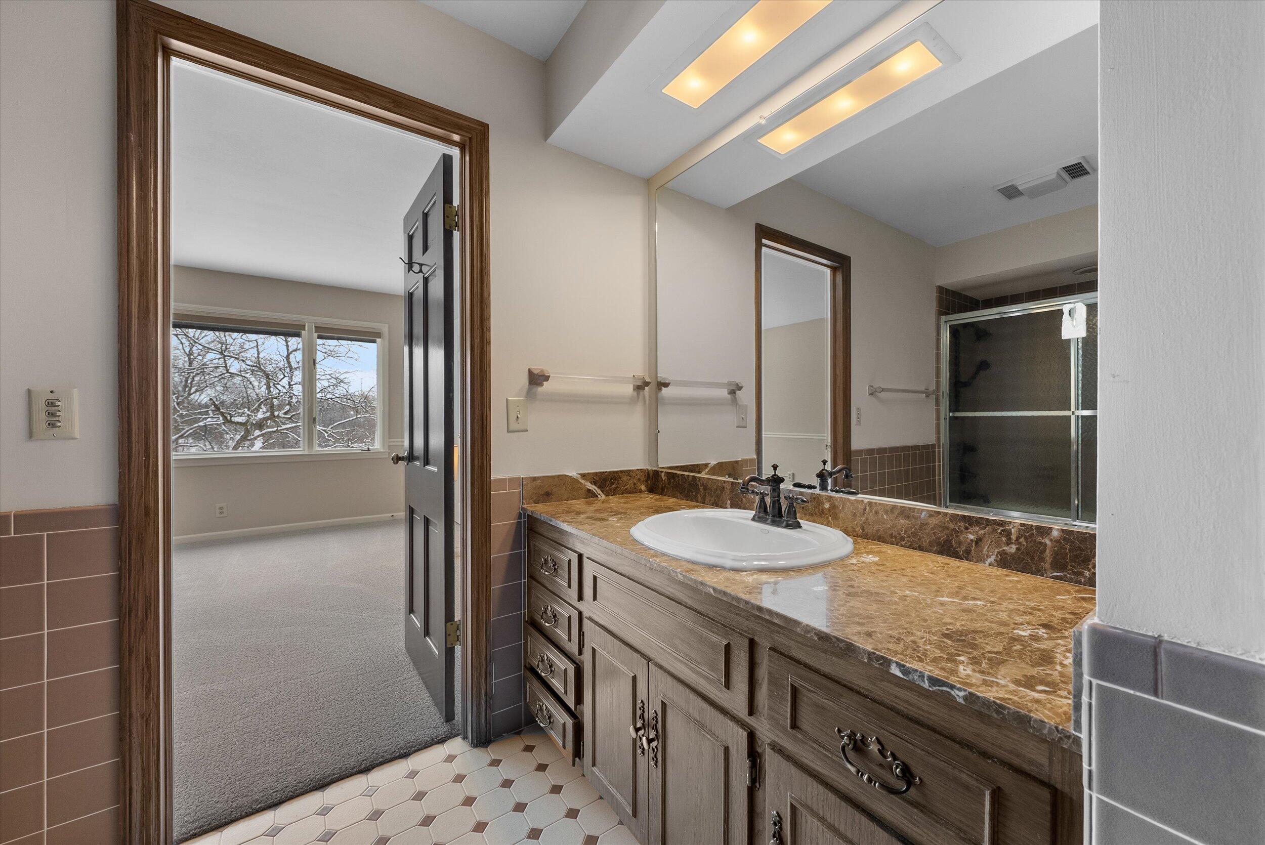 8704 West Bonniwell Road Mequon, WI 53097 - Photo 24 of 58 Bathroom