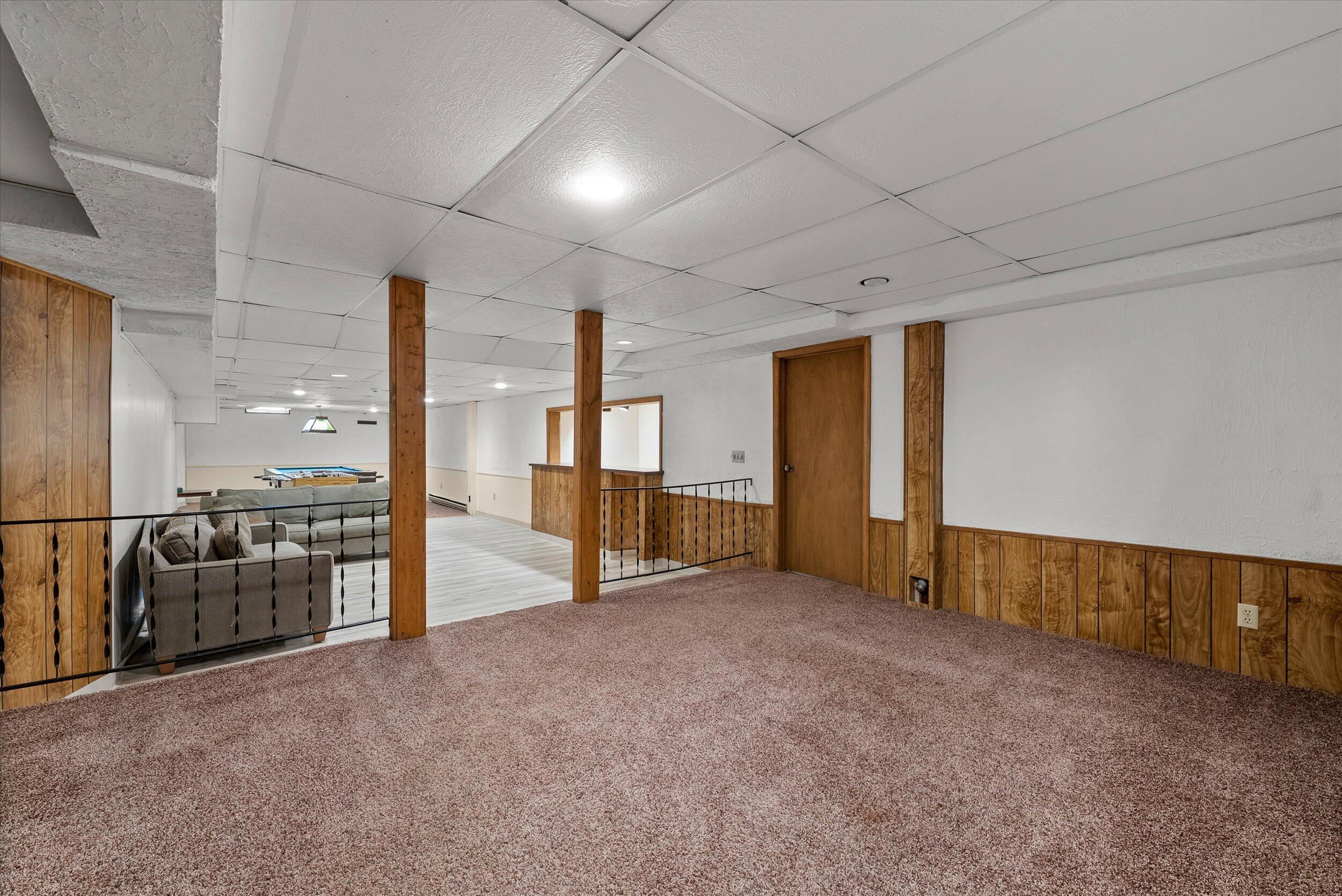 8704 West Bonniwell Road Mequon, WI 53097 - Photo 28 of 58 Lower Level Rec Room