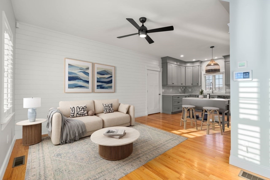 1 Dillingham Avenue Sandwich, MA 02563 - Photo 2 of 36 a living room with furniture and a view of kitchen