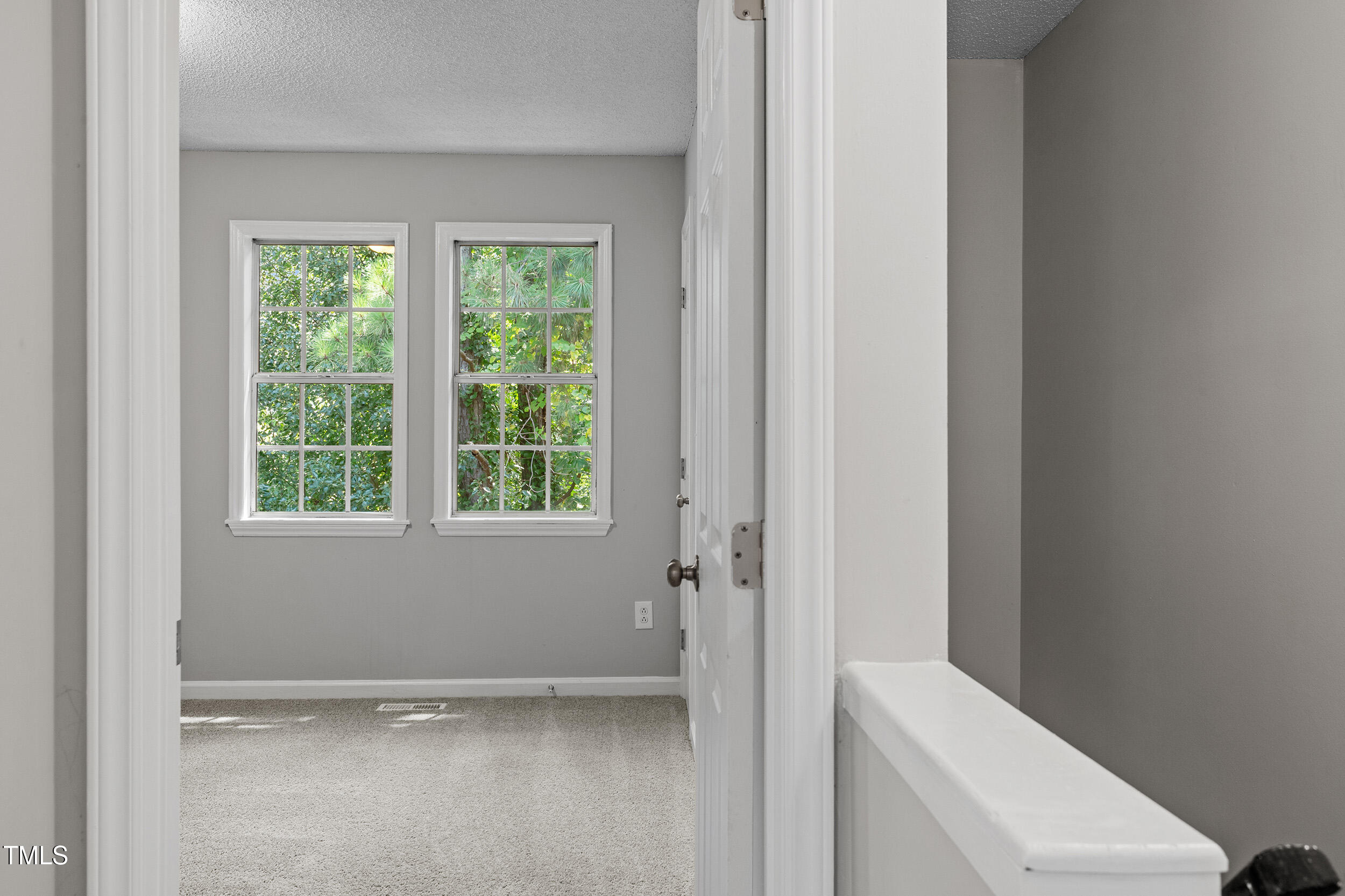 4242 Kaplan Drive Raleigh, NC 27606 - Photo 23 of 30 a view of an empty room with a window