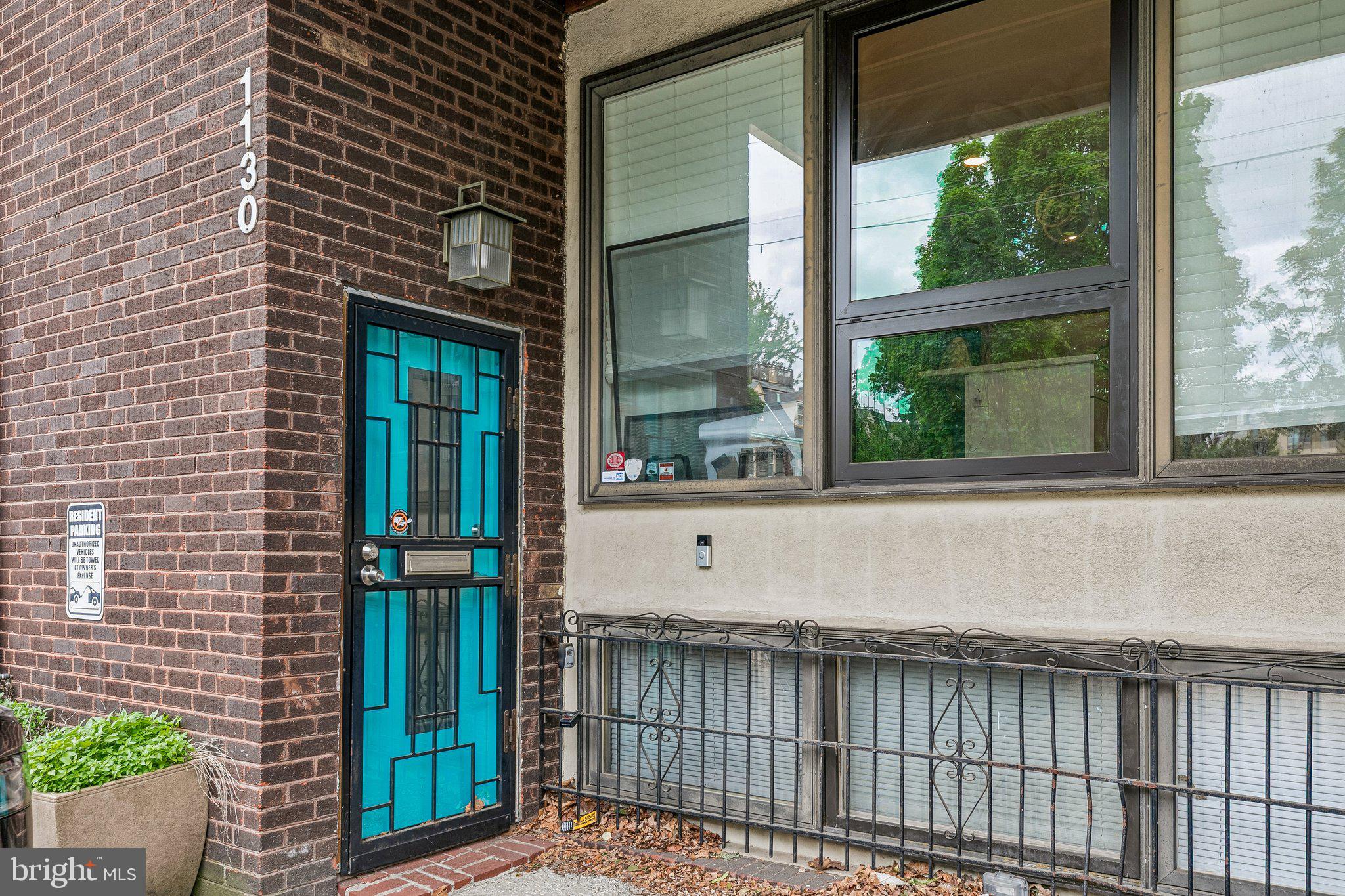 1130 Lombard Street Philadelphia, PA 19147 - Photo 44 of 45 a front view of a house with a glass door