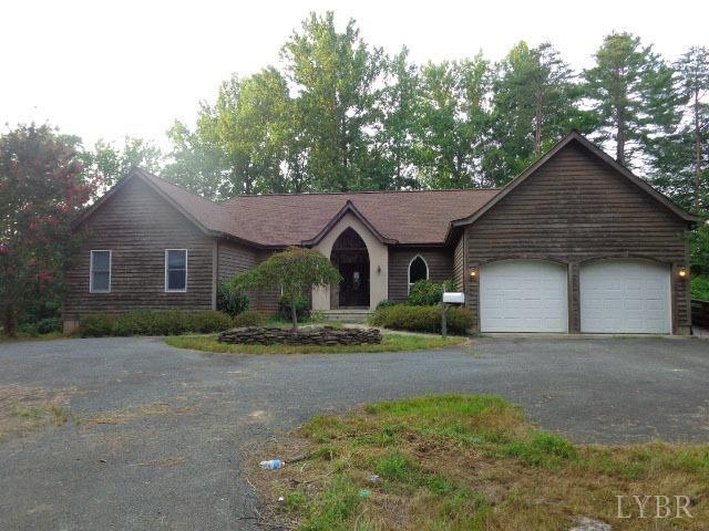 3742 Stony Point Road Charlottesville, VA 22911 - Photo 3 of 32 a front view of a house with a yard and garage