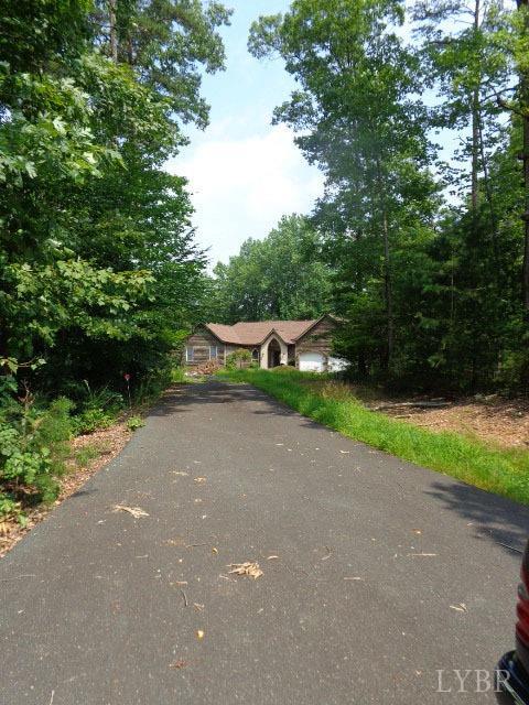 3742 Stony Point Road Charlottesville, VA 22911 - Photo 31 of 32 a view of a street with a bench and trees