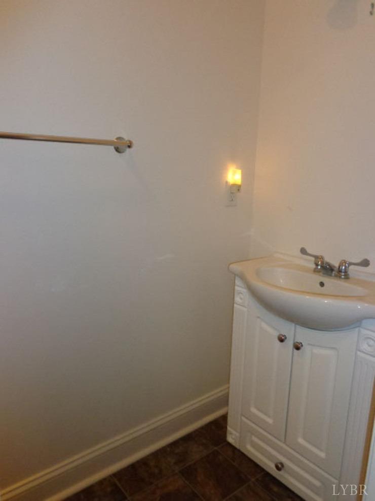 3742 Stony Point Road Charlottesville, VA 22911 - Photo 10 of 32 a bathroom with a sink and mirror