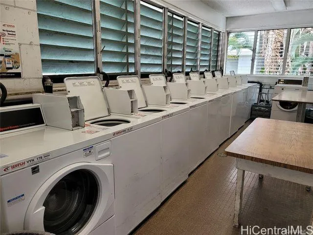 a view of kitchen and sink