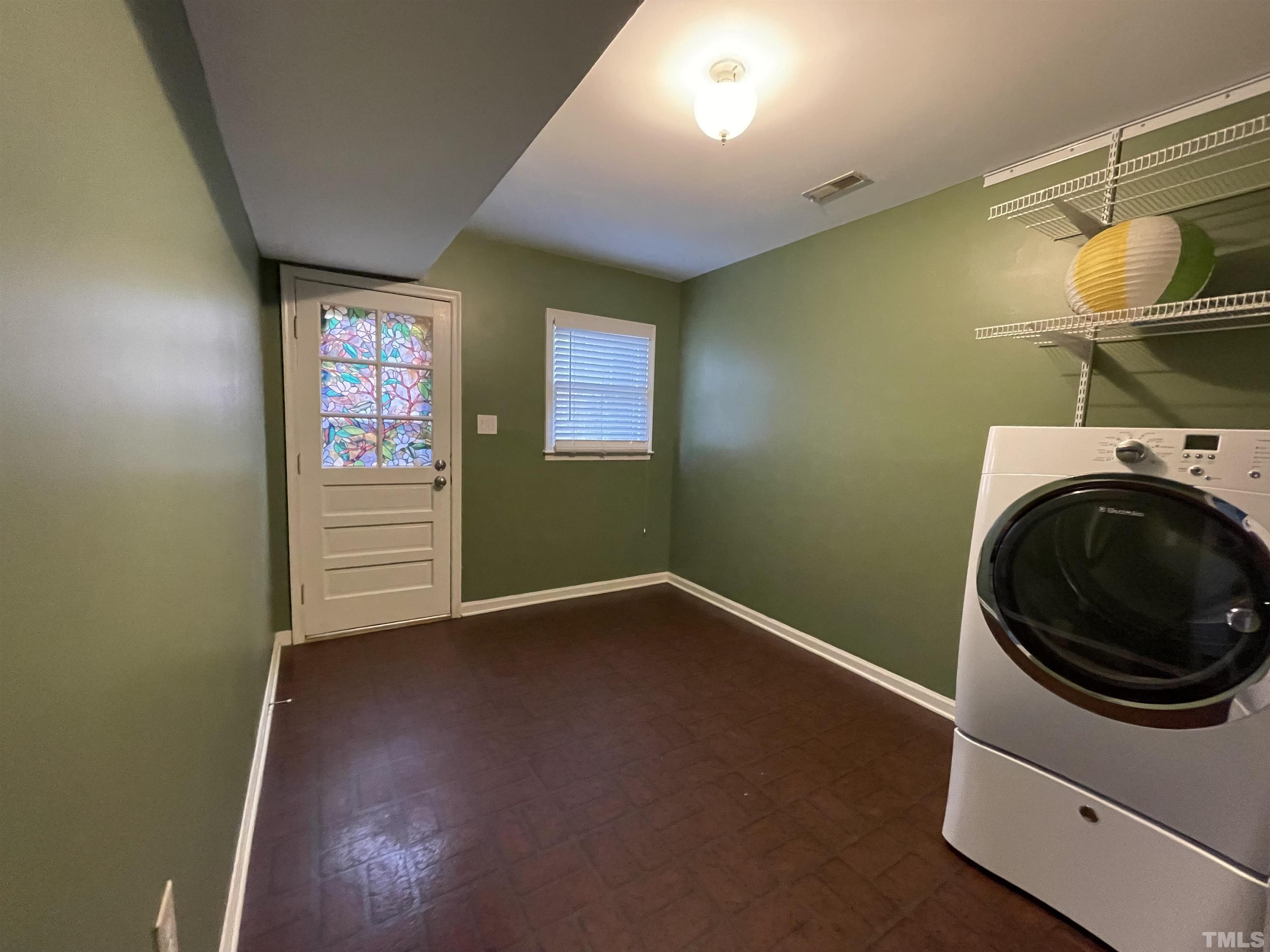501 Sawmill Road Raleigh, NC 27615 - Photo 20 of 31 a view of empty room with washer and dryer