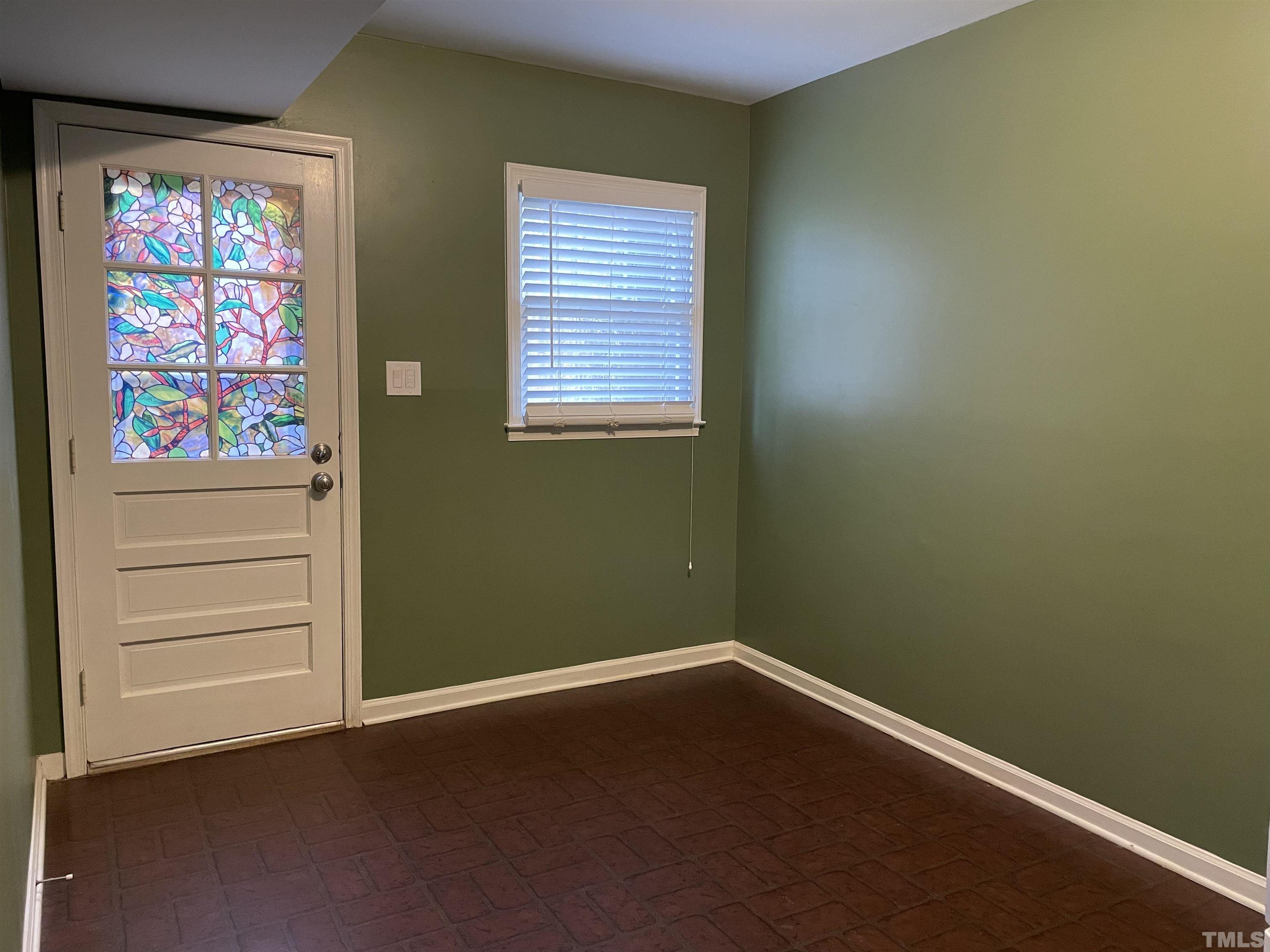 501 Sawmill Road Raleigh, NC 27615 - Photo 21 of 31 an empty room with windows