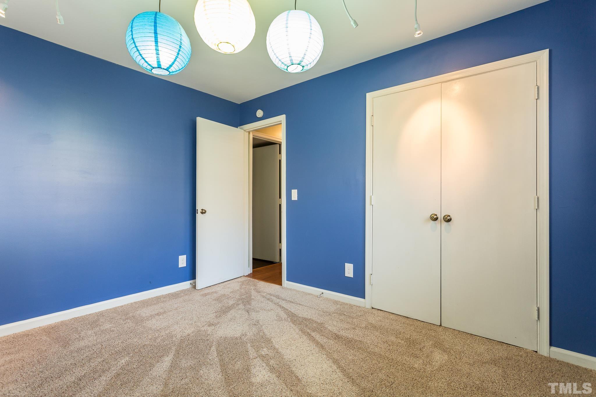 501 Sawmill Road Raleigh, NC 27615 - Photo 24 of 31 a view of an empty room with a window